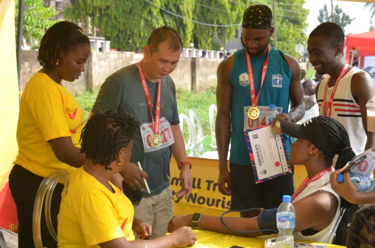 Race-day support team assisting CCR participants